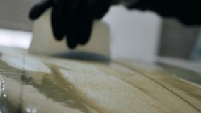 Man crafts unique surfboard at his shaping workshop in California - Powered by Shutterstock - Get 15% off with code: PIKWIZARD15