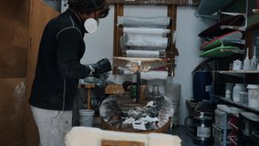 Mastering surfboard shaping in a creative workshop by an expert craftsman - Powered by Shutterstock - Get 15% off with code: PIKWIZARD15