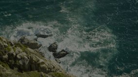 At start cyan HUD appearing, radial bars scanning clockwise, sector sweeping, indicating coast scan. Aerial, shoreline, rocks, waves, seascape, overlay, interface - Powered by Shutterstock - Get 15% off with code: PIKWIZARD15