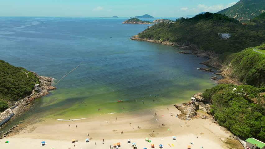 Big Wave Bay Hong Kong Island China Drone Track Back Pan 4K 60FPS
