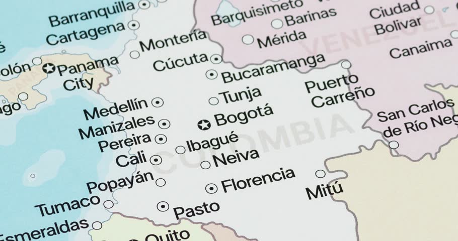 A zoom out of Colombia political map with country frontiers and most important cities