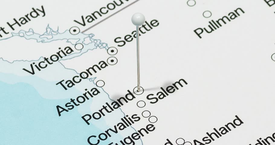 A zoom out of a white pin into Portland city of The United States of America political map