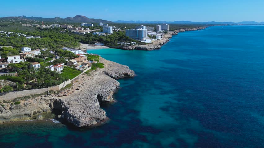Stunning drone footage of luxury real estate developments near Cala Murada in Mallorca, Balearic Islands.