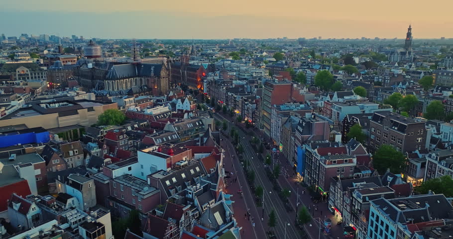 Aerial view of Amsterdam, Netherlands. View of canal and famous places of old centre district, railway station Amsterdam Centraal