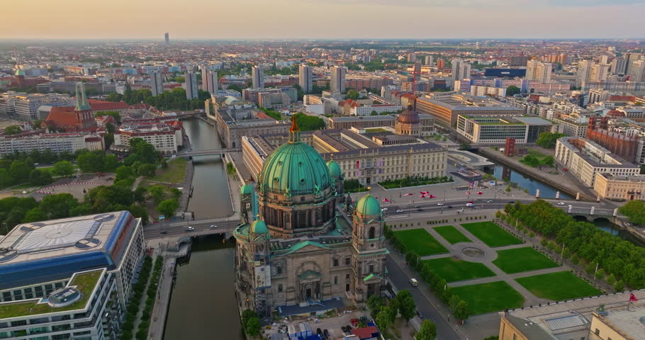Aerial view of Famous Berlin cathedral at sunrise with famous television tower is in the background. Berlin, Germany