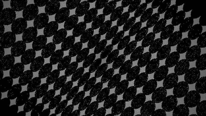 examining textured composite surface, close view of woven carbon material