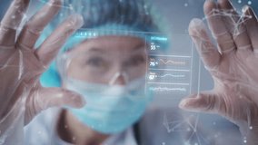 Medical worker wearing gloves holding holographic medical data with both hands. Digital screen showing patient history and health indicators. Futuristic diagnostic interface in bright clinic. - Powered by Shutterstock - Get 15% off with code: PIKWIZARD15