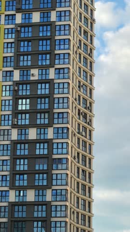 sun glare on the wall, sunbeams on the house, sun glare on the windows, beautiful play of light on the house, multi-storey house, multi-storey houses on a sunny day, large windows, very beautiful hous