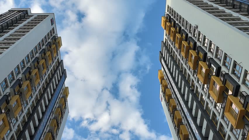 sun glare on the wall, sunbeams on the house, sun glare on the windows, beautiful play of light on the house, multi-storey house, multi-storey houses on a sunny day, large windows, very beautiful hous
