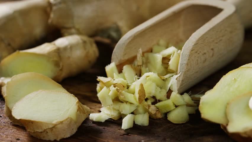 A clean composition featuring fresh ginger as a spicy, healthy ingredient used in food and drink for extra flavor.
