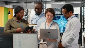 Engineering team in startup office working with AI technology driving market innovation. Tech agency coworkers applying machine learning to optimize operations and efficiency, camera B - Powered by Shutterstock - Get 15% off with code: PIKWIZARD15