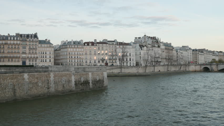 Seine River in Paris France at Sunset With Cinematic Dusk Sky Static Shot