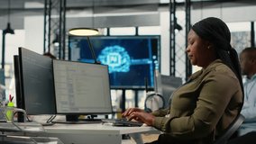 Team of technicians in office working together, automating workflows using AI. IT specialists collaborating to refine machine learning computational models for faster processing, camera B - Powered by Shutterstock - Get 15% off with code: PIKWIZARD15