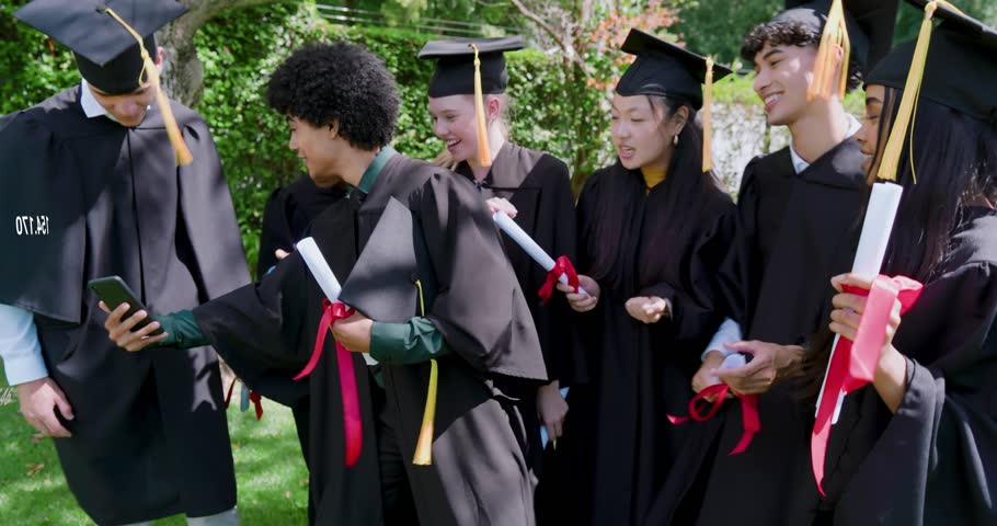 Curly grad holding phone, framing crew holding diplomas for grad selfie while globe overlay rising. Alumni, celebration, outdoor, campus, gowns, tassels, diplomas