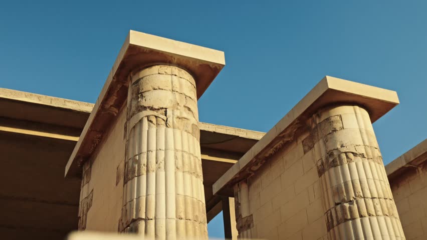 Stone columns at sunset within the Entrance Hall of the Step Pyramid Complex of Djoser at Saqqara.