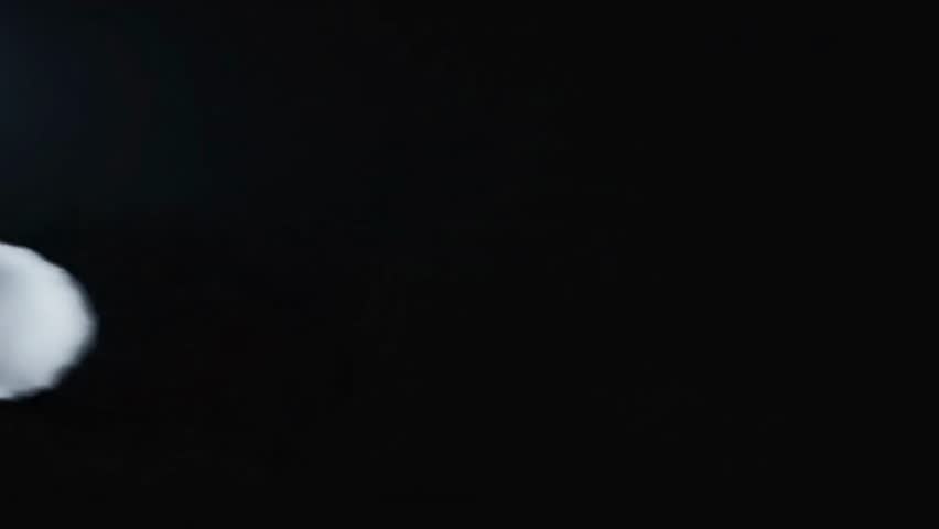 Ultra-Realistic White Steam and Cold Wind Swirling on Black Background with Dramatic Side Lighting for Clean VFX Compositing.