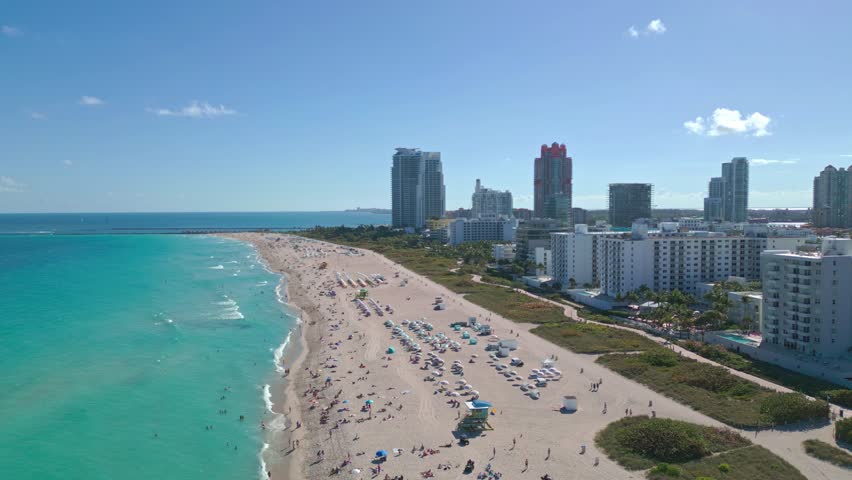 Miami beach, ocean drive summer cityscape. Miami Beach, South Beach, Florida, USA. Coastline, aerial view in Miami. Aerial view of high skyscrapers and ocean, Miami Beach, Florida, United States.