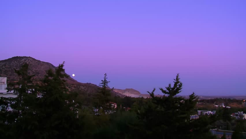 Panoramic Sunset View of Nicosia, North Cyprus with Moon, Mountains and City Traffic