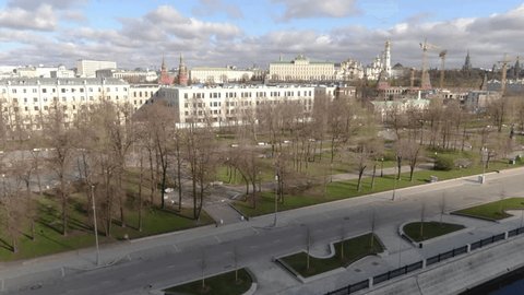 Drone Lifting Upward above Urban Landscape Park