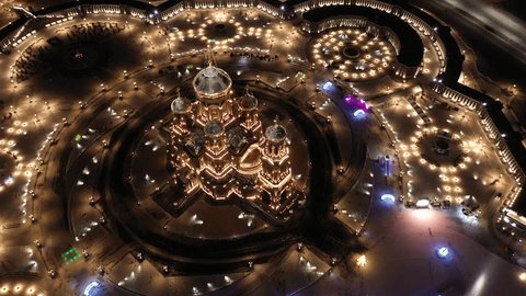 Aerial Circular Drone View around Lit Cathedral