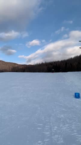 Winter and outdoor fun snowy activities, ski, tube slide, snow mobile, banana boat ride at Snow Valley, China 