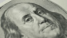 100 dollar bill, focusing on Benjamin Franklin portrait. Deposit money used in banking and financial systems. Currency used as medium of exchange in domestic and international markets - Powered by Shutterstock - Get 15% off with code: PIKWIZARD15