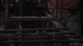Close-up shows worker cutting metal bar with angle grinder producing bright sparks. - Powered by Shutterstock - Get 15% off with code: PIKWIZARD15