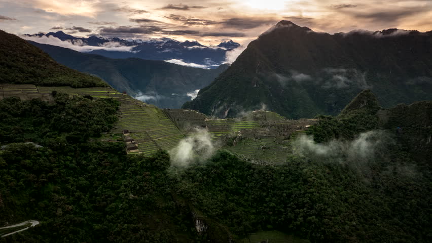 Drone hyperlapse view of UNESCO site Machu Picchu Inca citadel in Peru at sunset