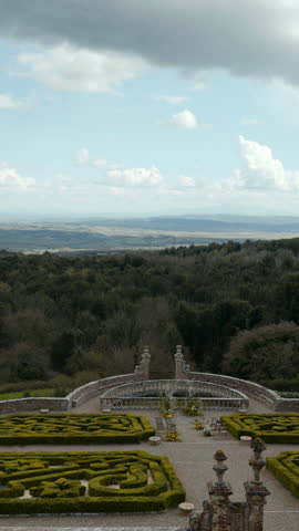 Clouds passing over italian formal garden and landscape. Action