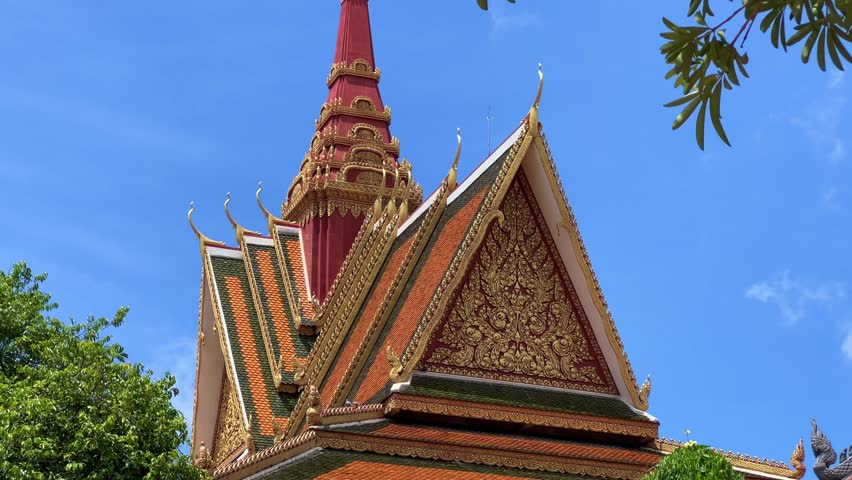 SIEMREAP, CAMBODIA - October 6, 2025: The interior of Wat Preah Prom Rath Temple. A Buddhist temple with statues of cows. A decorative structure made of gold. The main spiritual center of Siemreap. 4К