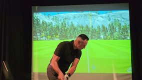 Golf swing practice in indoor simulator with realistic landscape and detailed graphics - Powered by Shutterstock - Get 15% off with code: PIKWIZARD15