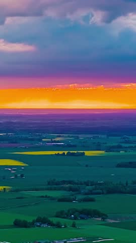 Sunset Sky With Stormy Clouds Over Countryside Landscape - Timelapse, Vertical Shot