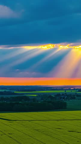 Colorful Sunset Sky With Clouds Over Farm Fields - Vertical, Timelapse
