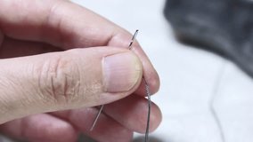 Close-up of hands carefully guiding a needle through soft plush fabric. Ideal for themes of mindful crafting, slow fashion, handmade toys, or tactile creativity content.
 - Powered by Shutterstock - Get 15% off with code: PIKWIZARD15