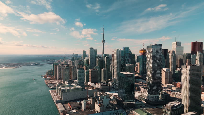 TORONTO, ONTARIO - JANUARY 1, 2025: Winter skyline and Lake Ontario from aerial perspective