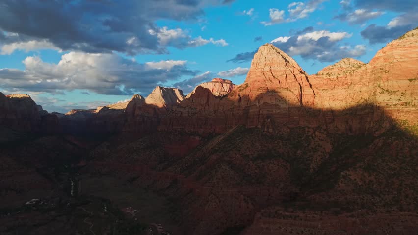 Drone shot of rock formations in Zion National Park during sunset