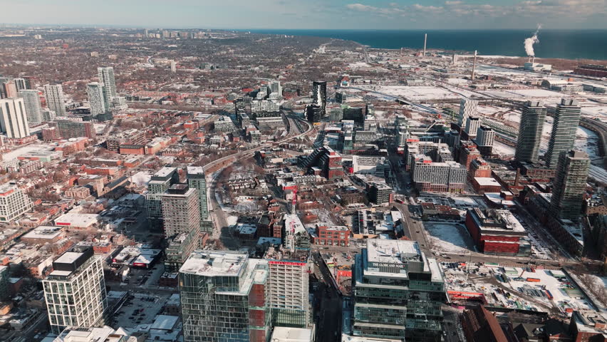 TORONTO, ONTARIO - JANUARY 1, 2025: Winter aerial of Toronto waterfront and industrial zone