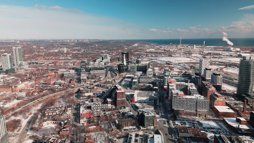 TORONTO, ONTARIO - JANUARY 1, 2025: Winter aerial of Toronto waterfront and industrial zone