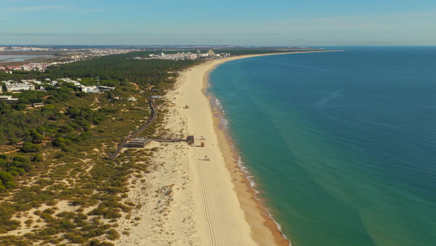 Sunny Empty Beach Praia Verde near Monte Gordo, Portugal Aerial
