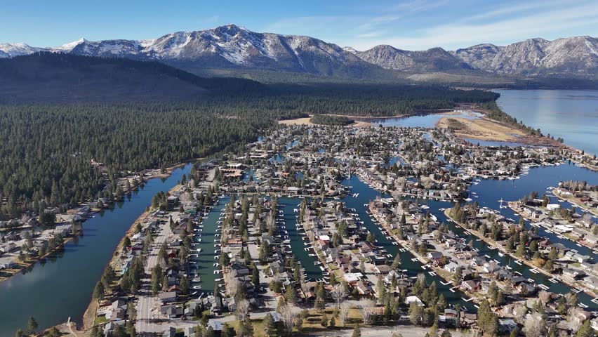 Aerial view of Lake Valley and Meyers with pine forest and highway leading to Lake Tahoe
