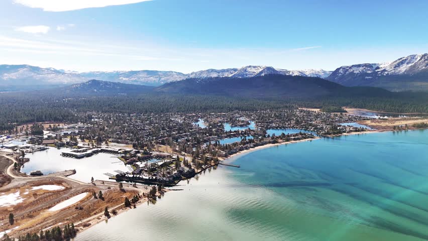 Aerial view of Lake Valley and Meyers with pine forest and highway leading to Lake Tahoe
