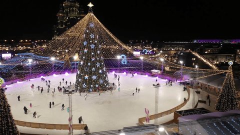 Sideways Drone Orbit around Festive Night Ice