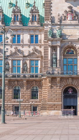 Entrance to the building of the Hamburg City Hall timelapse, the seat of the government of Hamburg, located in the Altstadt quarter in the city center. Front view from the main square