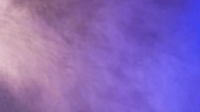 Colorful abstract purple and blue smoke swirls over a black background, captured in 4K studio footage, creating vibrant and dynamic patterns for artistic and visual effects. - Powered by Shutterstock - Get 15% off with code: PIKWIZARD15