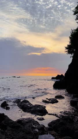 Sunset Through Coastal Rock Formation