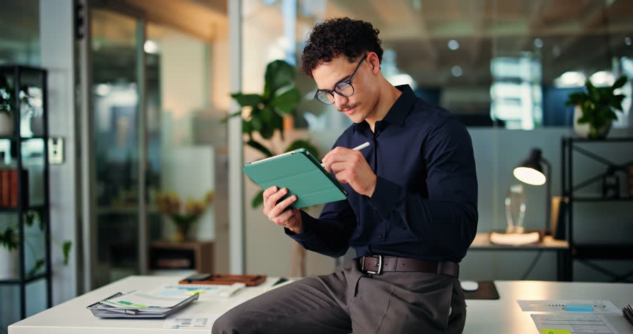 Reading, smile or man in office with tablet, profit update or good news on investment return. Finance, stylus or analyst in agency with tech, budget review or revenue growth on client account.