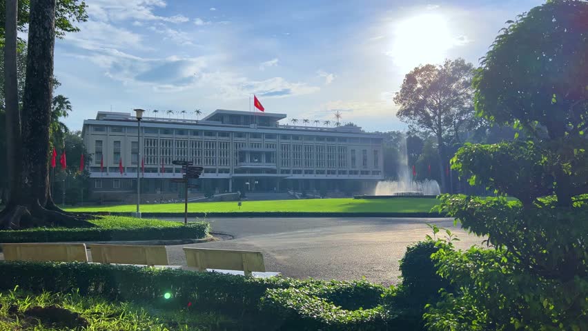 Ho Chi Minh City, Vietnam - September 18, 2025: View of the Independence or Reunification Palace, formerly Saigon. Dinh Choc Lop. A beautiful fountain sprays in front of the palace in bright daylight.