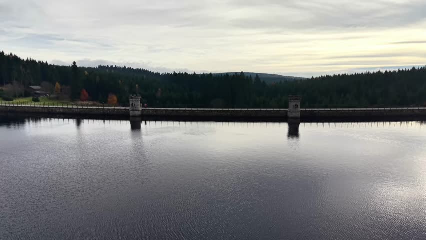 Aerial Lake Clearing After Fog, Observation Drone Documents Mist Pulling Back To Reveal Dark Water