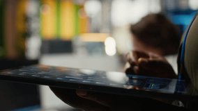 Close up of tablet used by admin in office doing software development to launch new features. Device used by system administrator in startup company writing computer programs, camera A - Powered by Shutterstock - Get 15% off with code: PIKWIZARD15