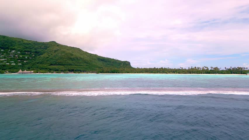 Scenic Aerial shot of Plage de Temae Public Beach in Moorea French Polynesia